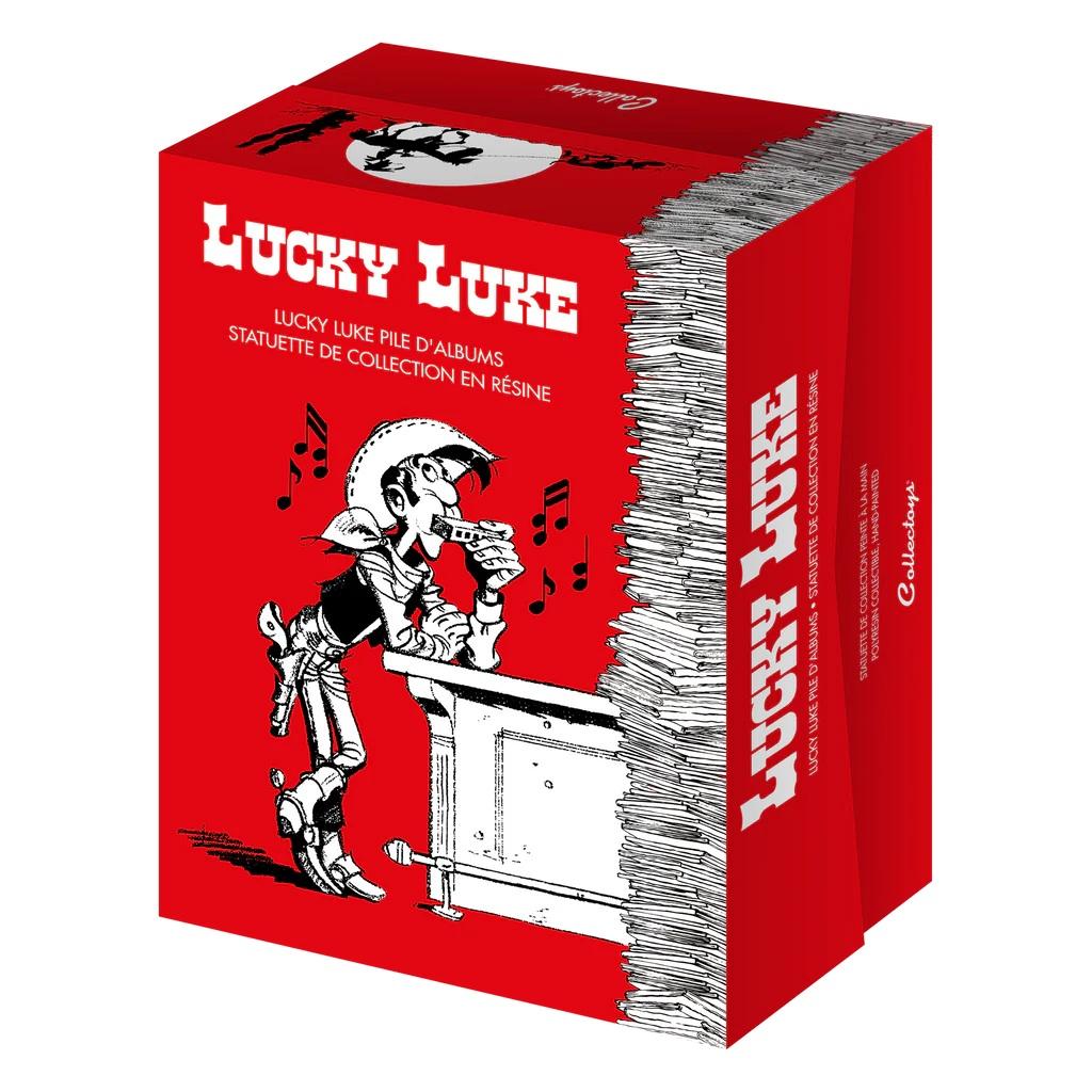 LUCKY LUKE - Lucky Luke & Rantamplan on stack of comics - Statue 25cm