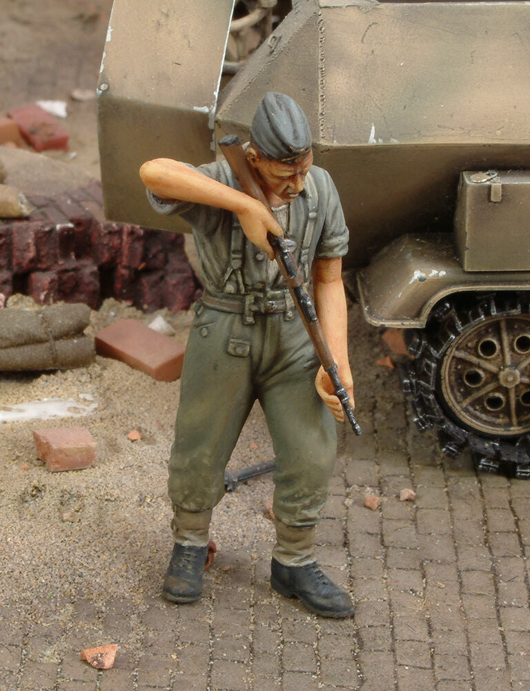 German soldier cleaning rifle-WWII